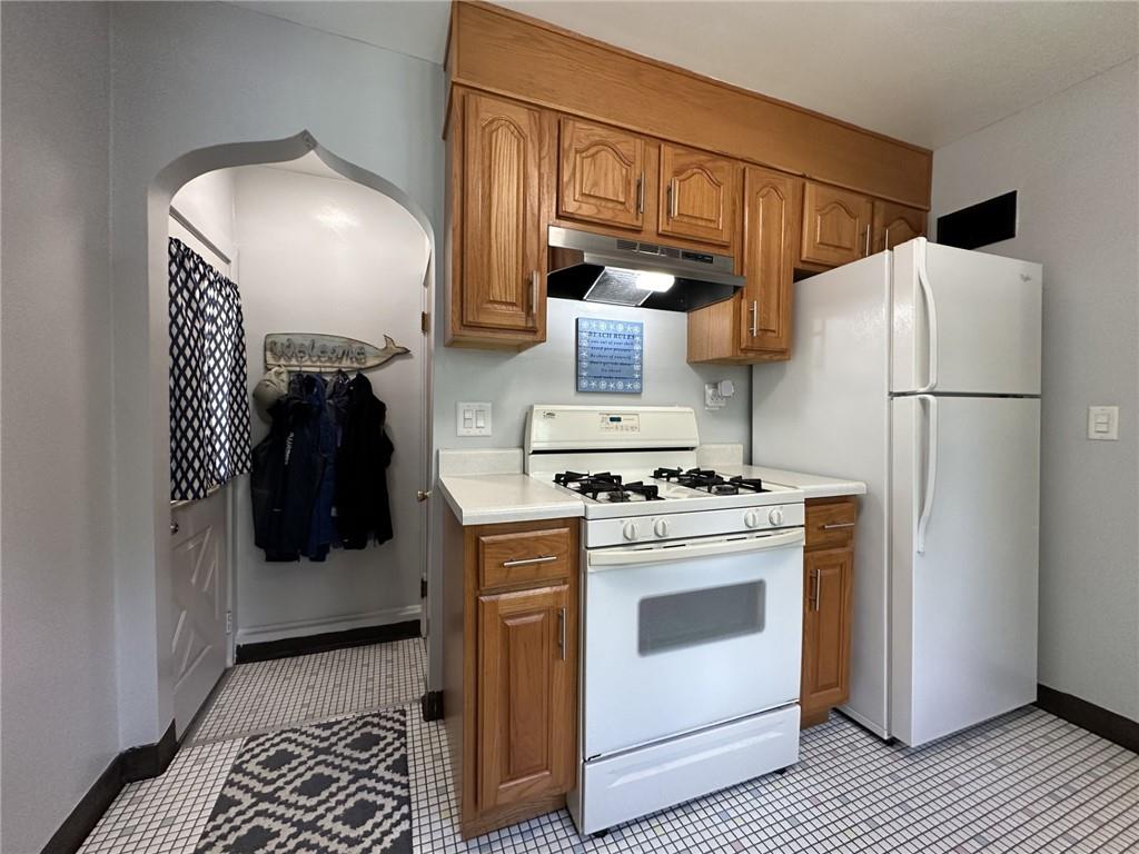 1804 River Road North Apollo, PA 15673 - Photo 12 of 39 a kitchen with a stove and a refrigerator