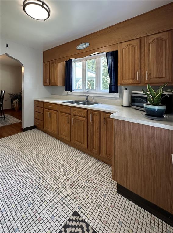 1804 River Road North Apollo, PA 15673 - Photo 13 of 39 a large kitchen with stainless steel appliances wooden cabinets a stove and a sink