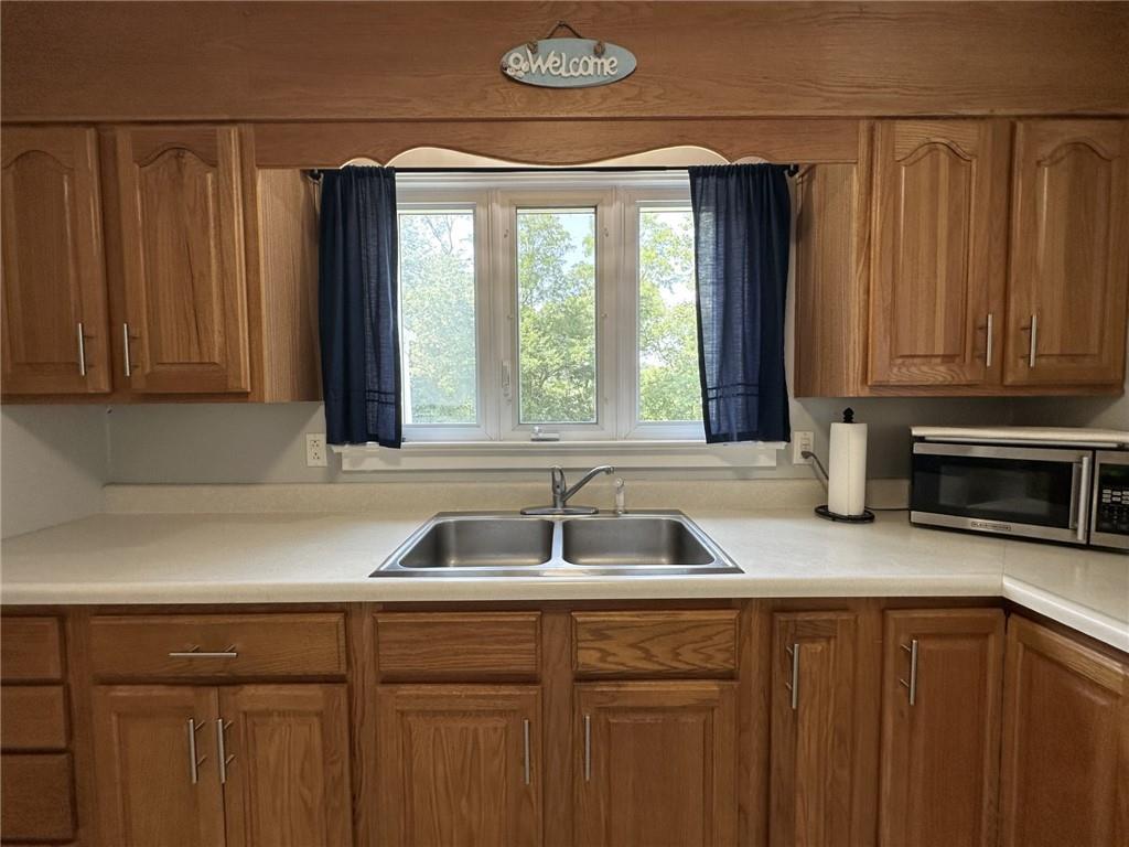1804 River Road North Apollo, PA 15673 - Photo 14 of 39 a kitchen with a sink and a window