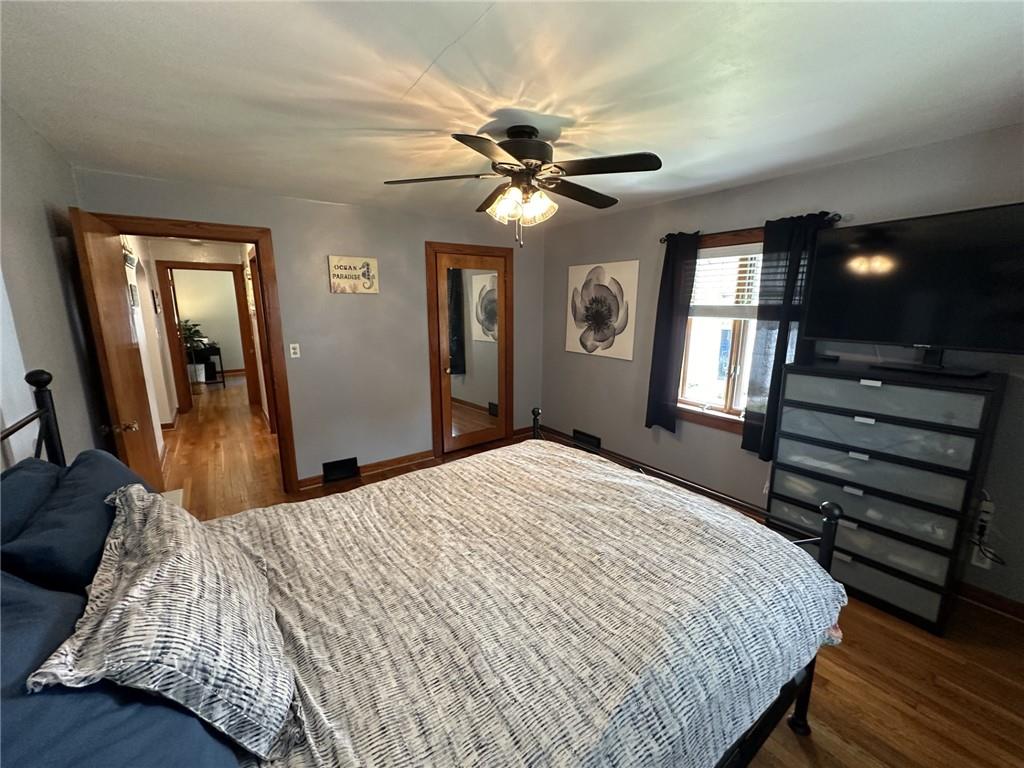 1804 River Road North Apollo, PA 15673 - Photo 29 of 39 a bedroom with a bed and a chandelier