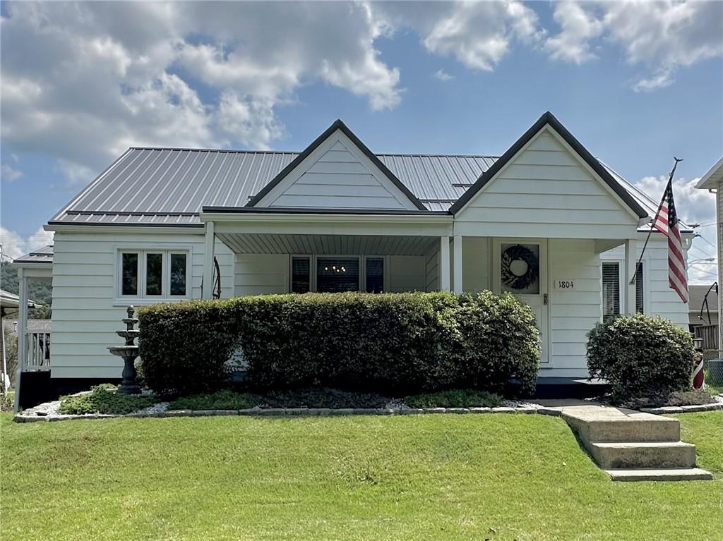 1804 River Road North Apollo, PA 15673 - Photo 3 of 39 a front view of a house with a yard