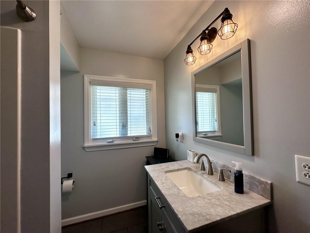 1804 River Road North Apollo, PA 15673 - Photo 32 of 39 a bathroom with a sink a vanity and a mirror