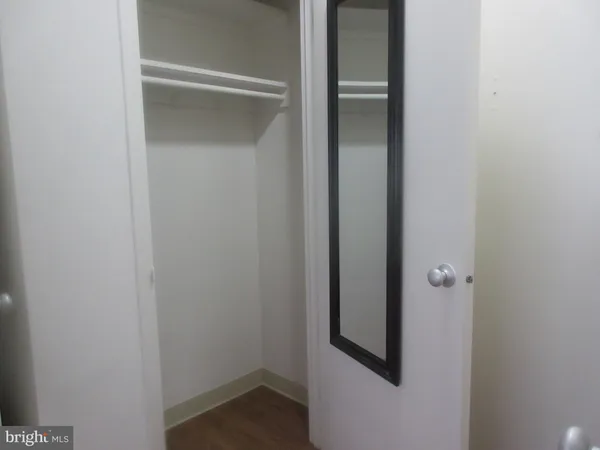 a room with a table and chairs