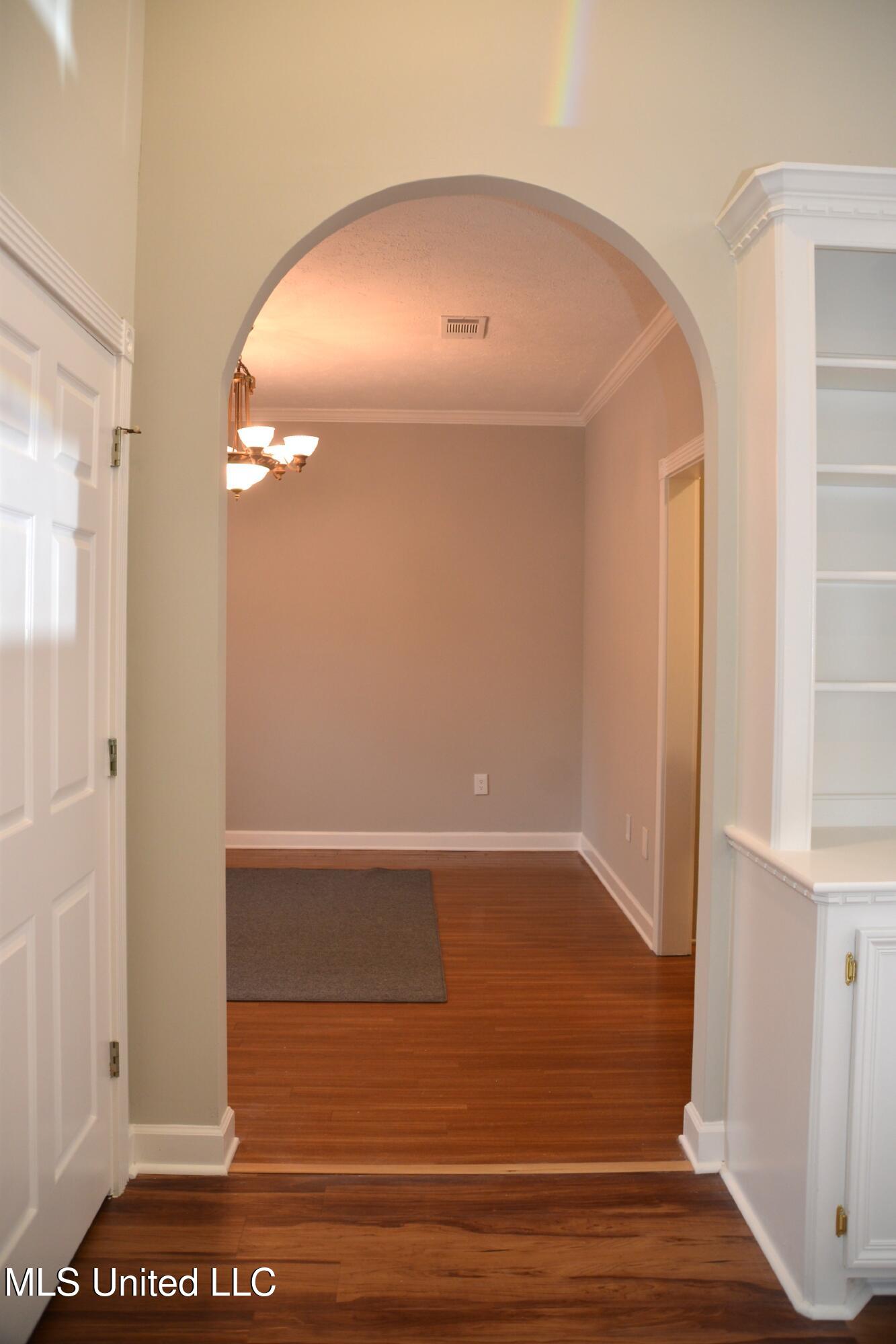 105 Fox Run Road Brandon, MS 39047 - Photo 8 of 26 Arch Entry to Dining Room