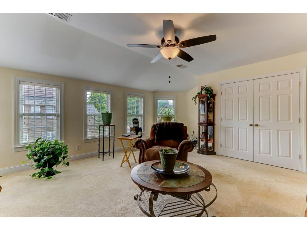 217 Eva Drive Gibsonville, NC 27249 - Photo 19 of 24 a living room with furniture