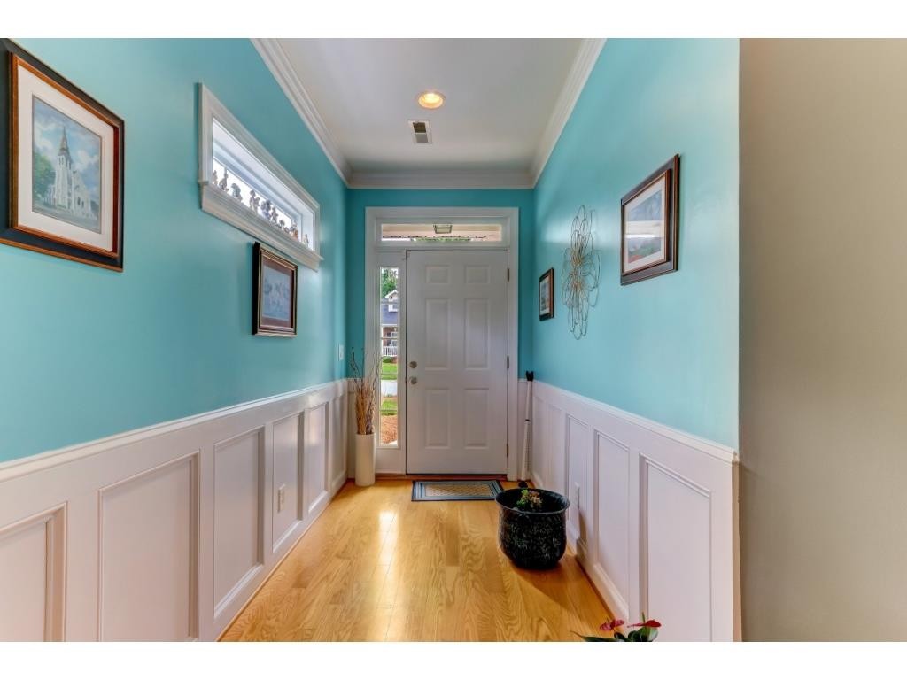 217 Eva Drive Gibsonville, NC 27249 - Photo 4 of 24 a view of an entryway