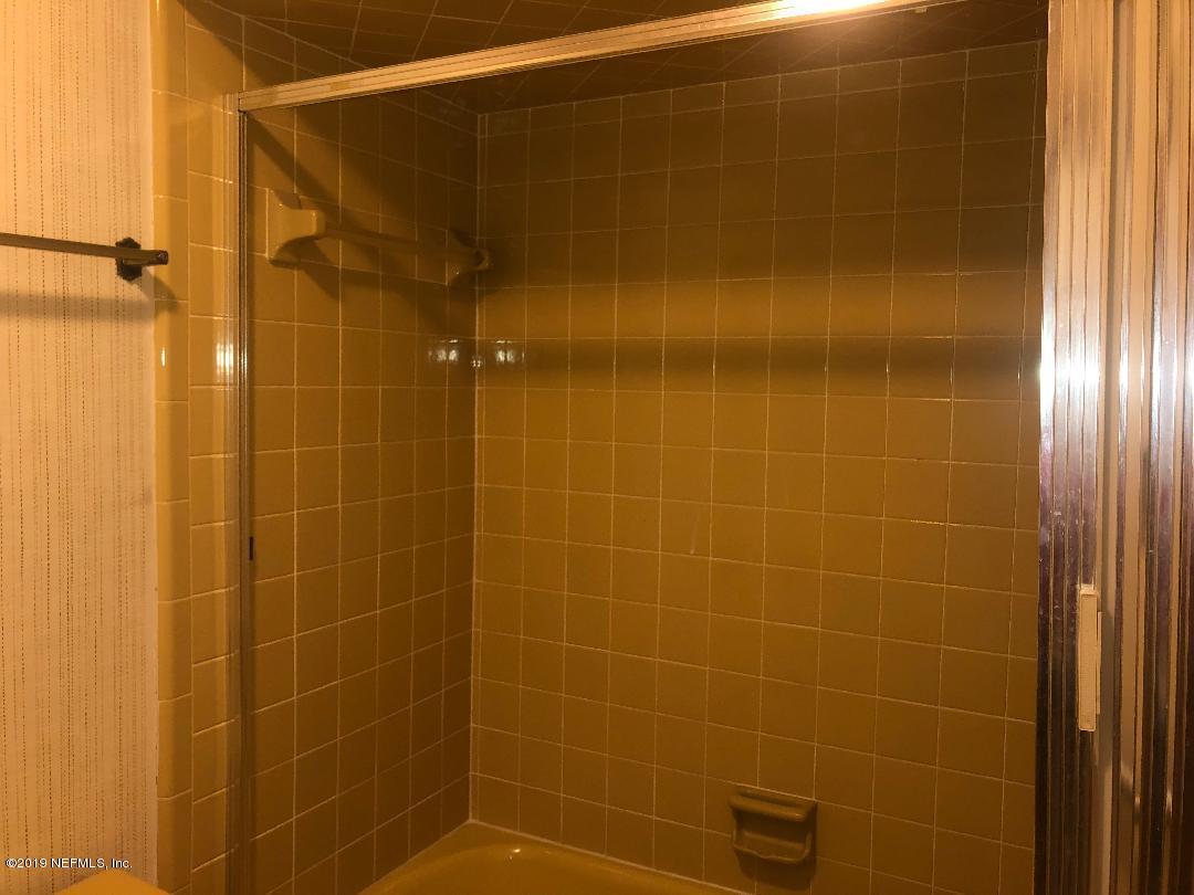 45142 Stratton Road Callahan, FL 32011 - Photo 28 of 29 a bathroom with a shower