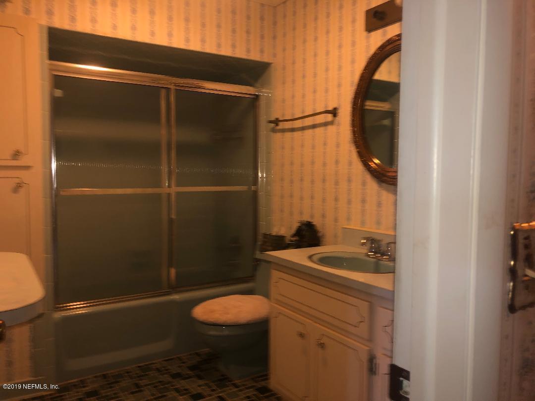 45142 Stratton Road Callahan, FL 32011 - Photo 29 of 29 a bathroom with a sink toilet and shower