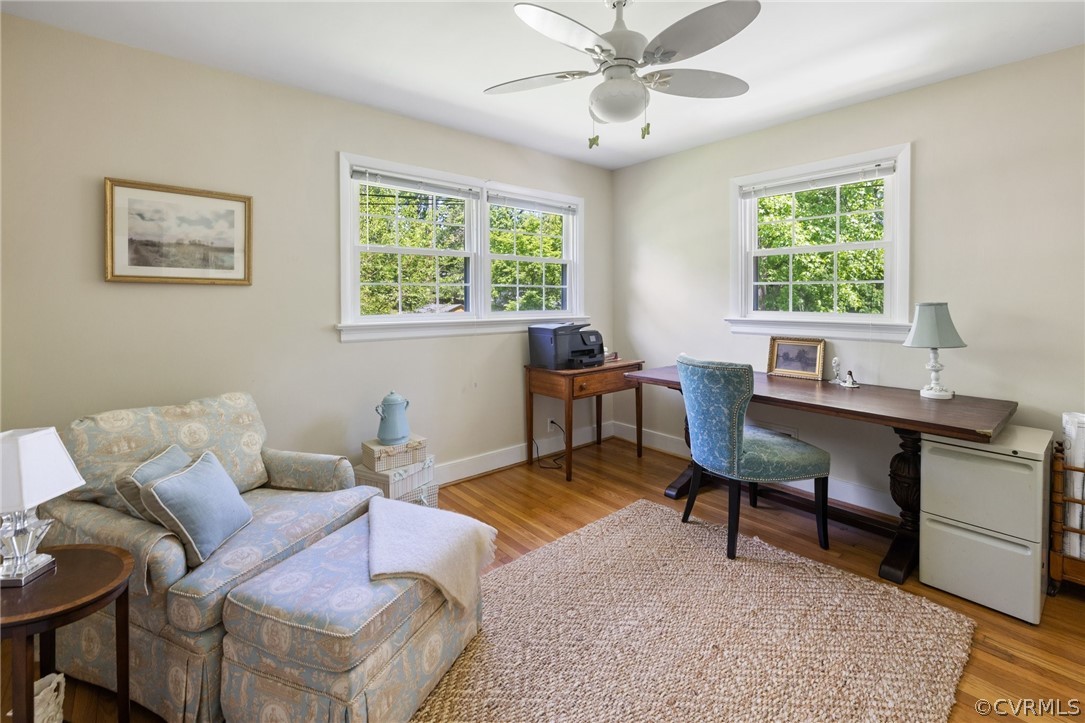7658 Cherokee Road Richmond, VA 23225 - Photo 21 of 36 a living room with furniture and a window