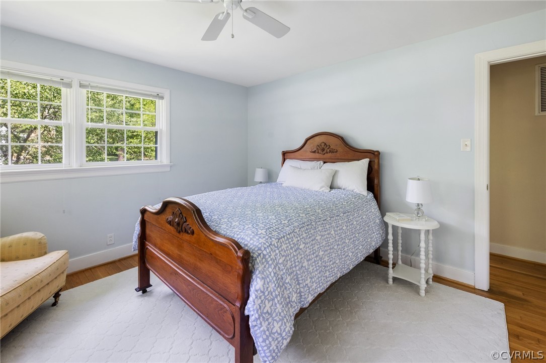 7658 Cherokee Road Richmond, VA 23225 - Photo 23 of 36 a bedroom with a bed and a window