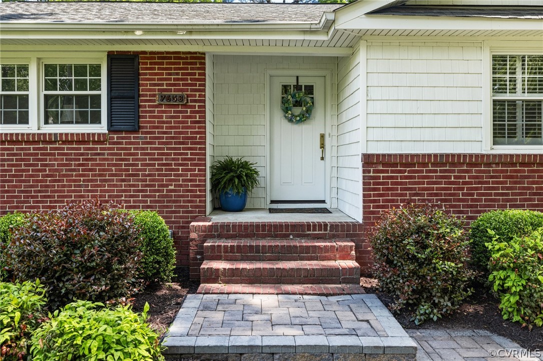 7658 Cherokee Road Richmond, VA 23225 - Photo 4 of 36 a view of a house with potted plants