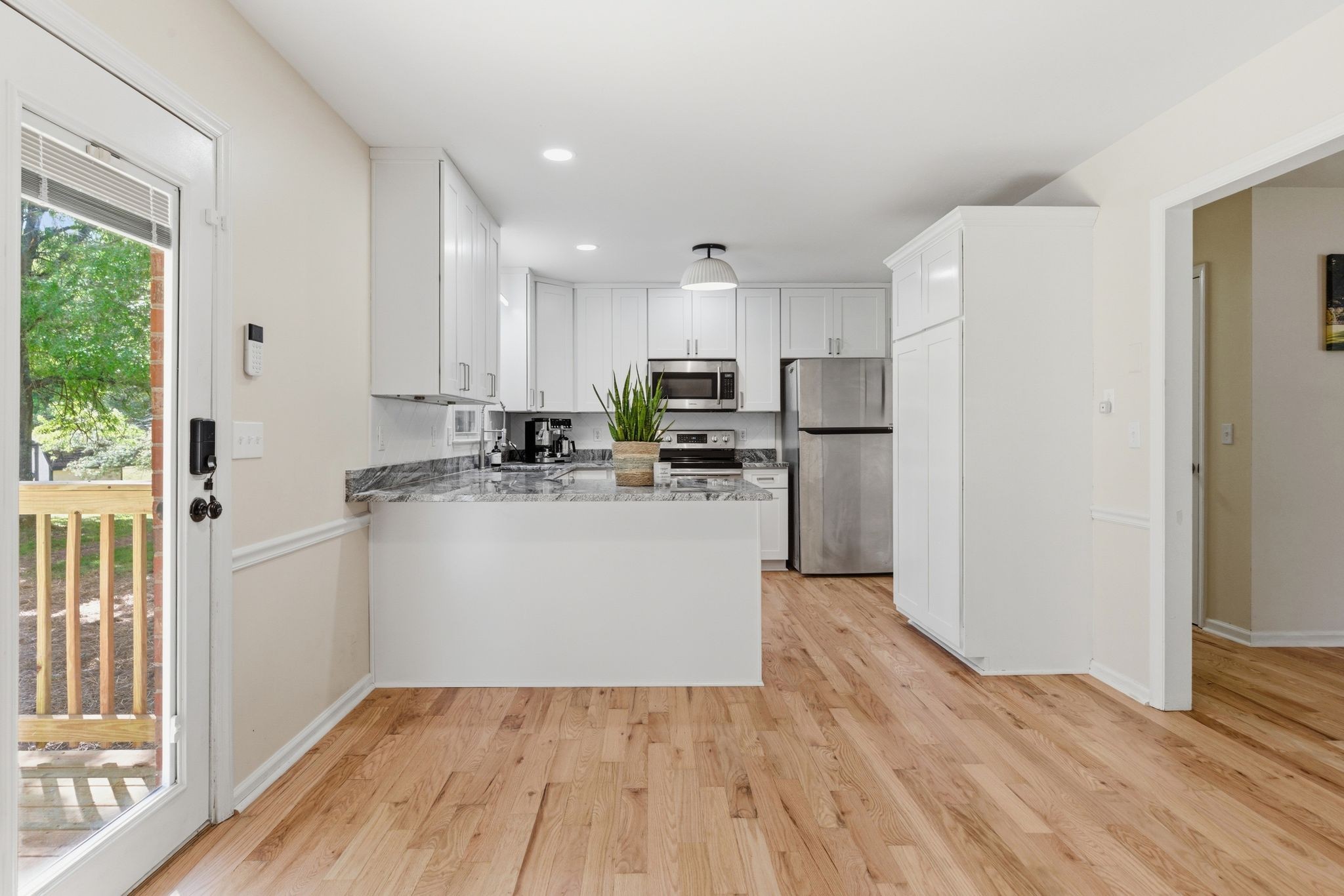 2306 Red Mile Road Murfreesboro, TN 37127 - Photo 11 of 43 a view of a kitchen with wooden floor