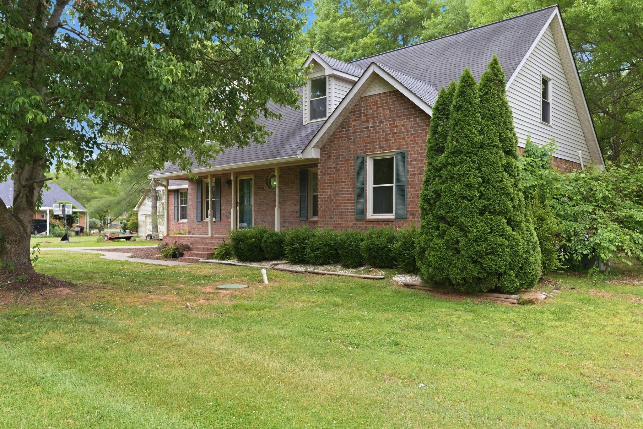 2306 Red Mile Road Murfreesboro, TN 37127 - Photo 2 of 43 front view of a house with a yard