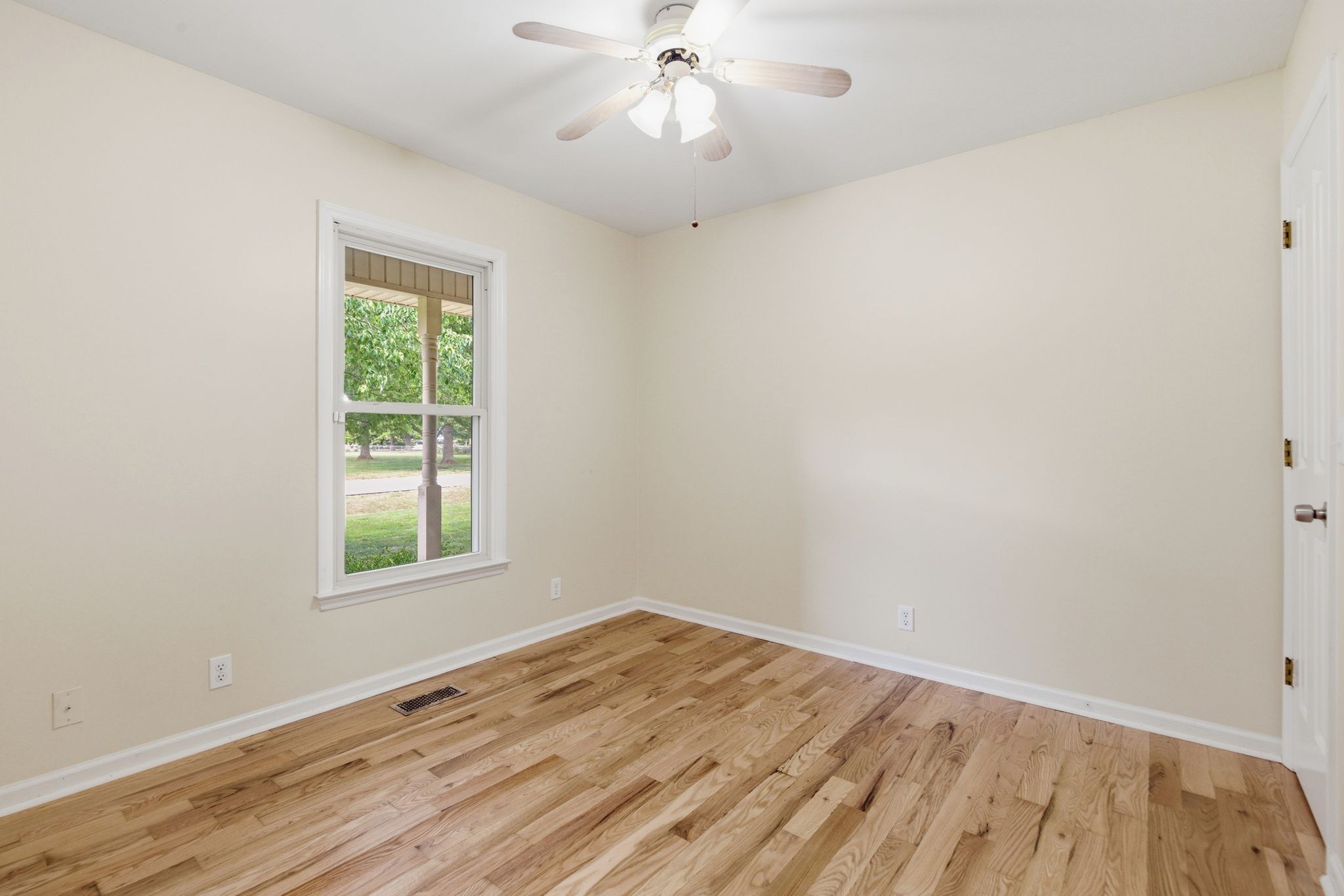 2306 Red Mile Road Murfreesboro, TN 37127 - Photo 24 of 43 an empty room with a window and wooden floor