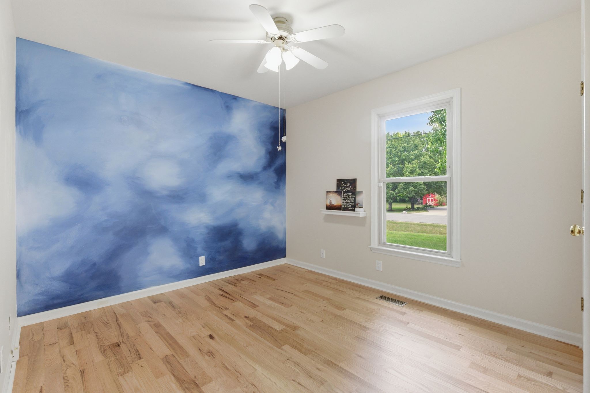2306 Red Mile Road Murfreesboro, TN 37127 - Photo 26 of 43 a view of empty room with window and ceiling fan