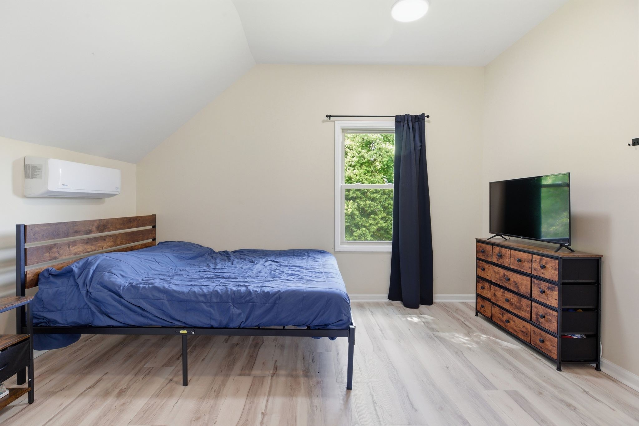 2306 Red Mile Road Murfreesboro, TN 37127 - Photo 32 of 43 a bedroom with a bed and a flat screen tv