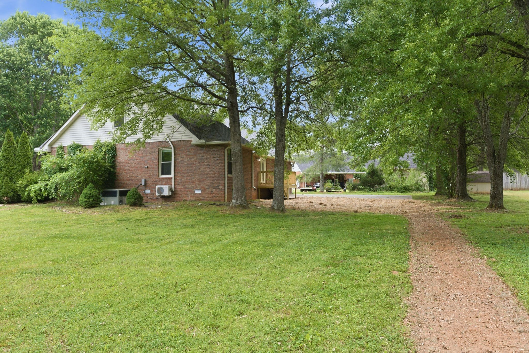 2306 Red Mile Road Murfreesboro, TN 37127 - Photo 38 of 43 a front view of a house with garden