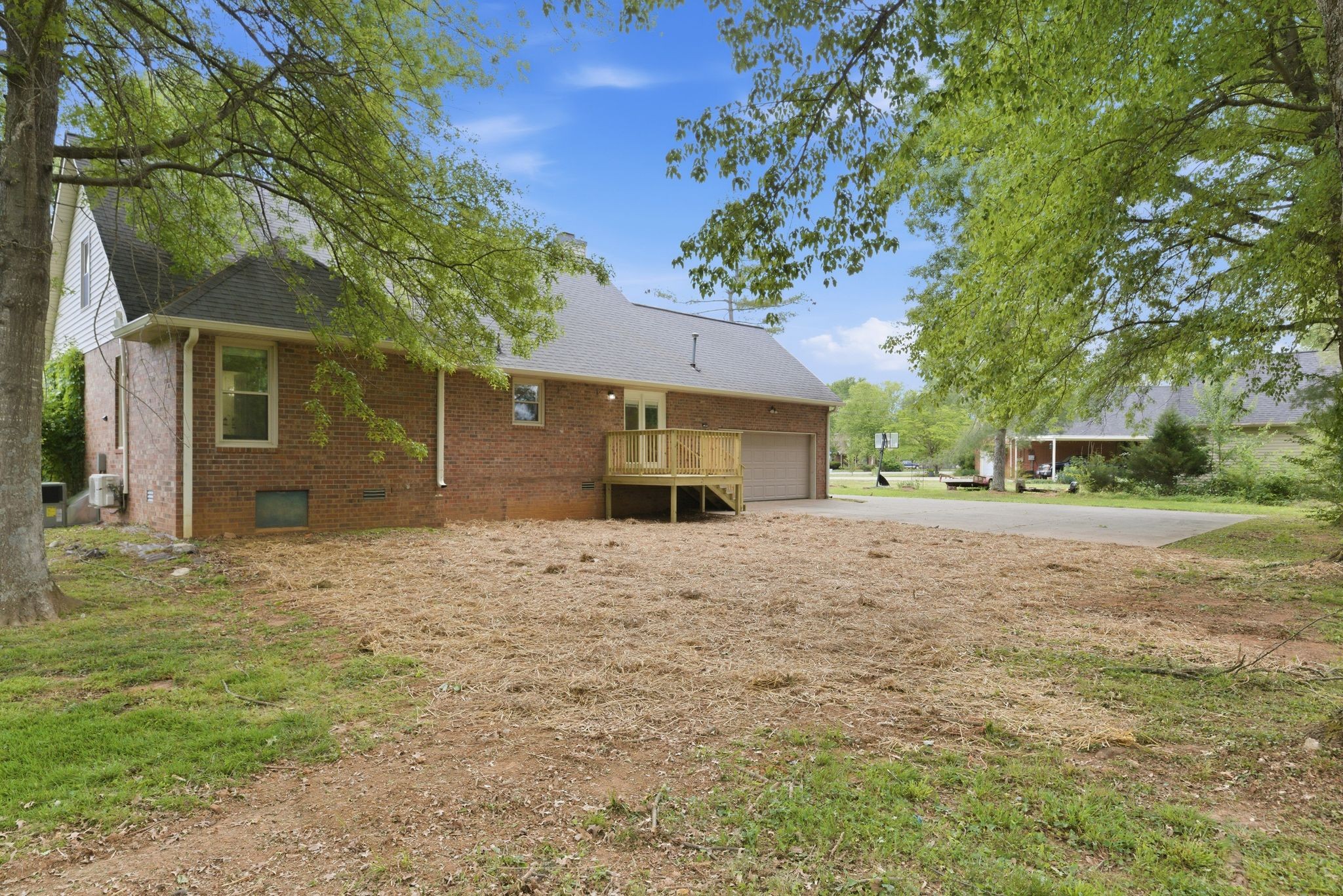 2306 Red Mile Road Murfreesboro, TN 37127 - Photo 39 of 43 a front view of a house with a yard and garage