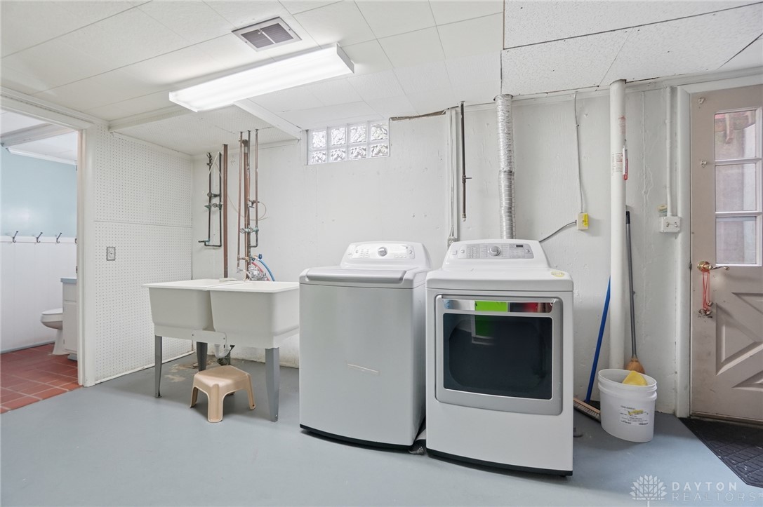 6119 Flemington Road Dayton, OH 45459 - Photo 55 of 76 Functional utility space with dedicated laundry facilities and convenient access.