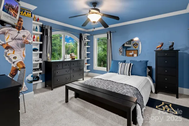 a bathroom with a granite countertop sink toilet and mirror