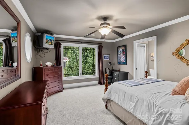 a bathroom with a granite countertop toilet sink and mirror