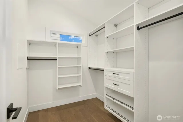 a view of an empty walk in closet