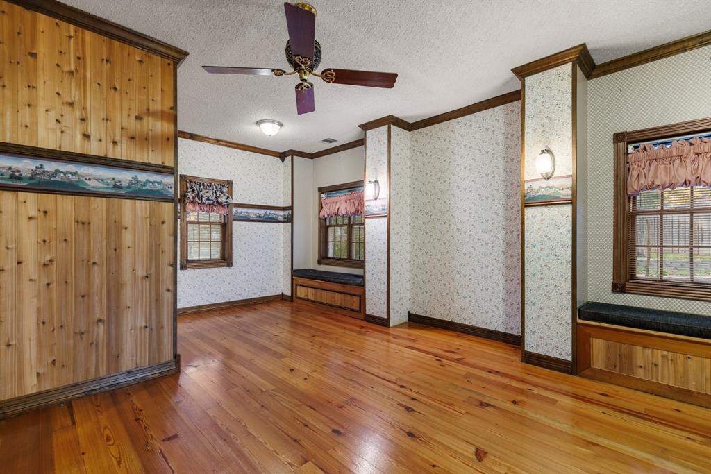 100 Linden Lane Hewitt, TX 76643 - Photo 14 of 31 a view of an empty room with window and wooden floor