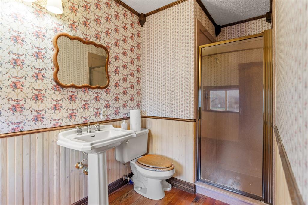 100 Linden Lane Hewitt, TX 76643 - Photo 24 of 31 a bathroom with a toilet sink and mirror