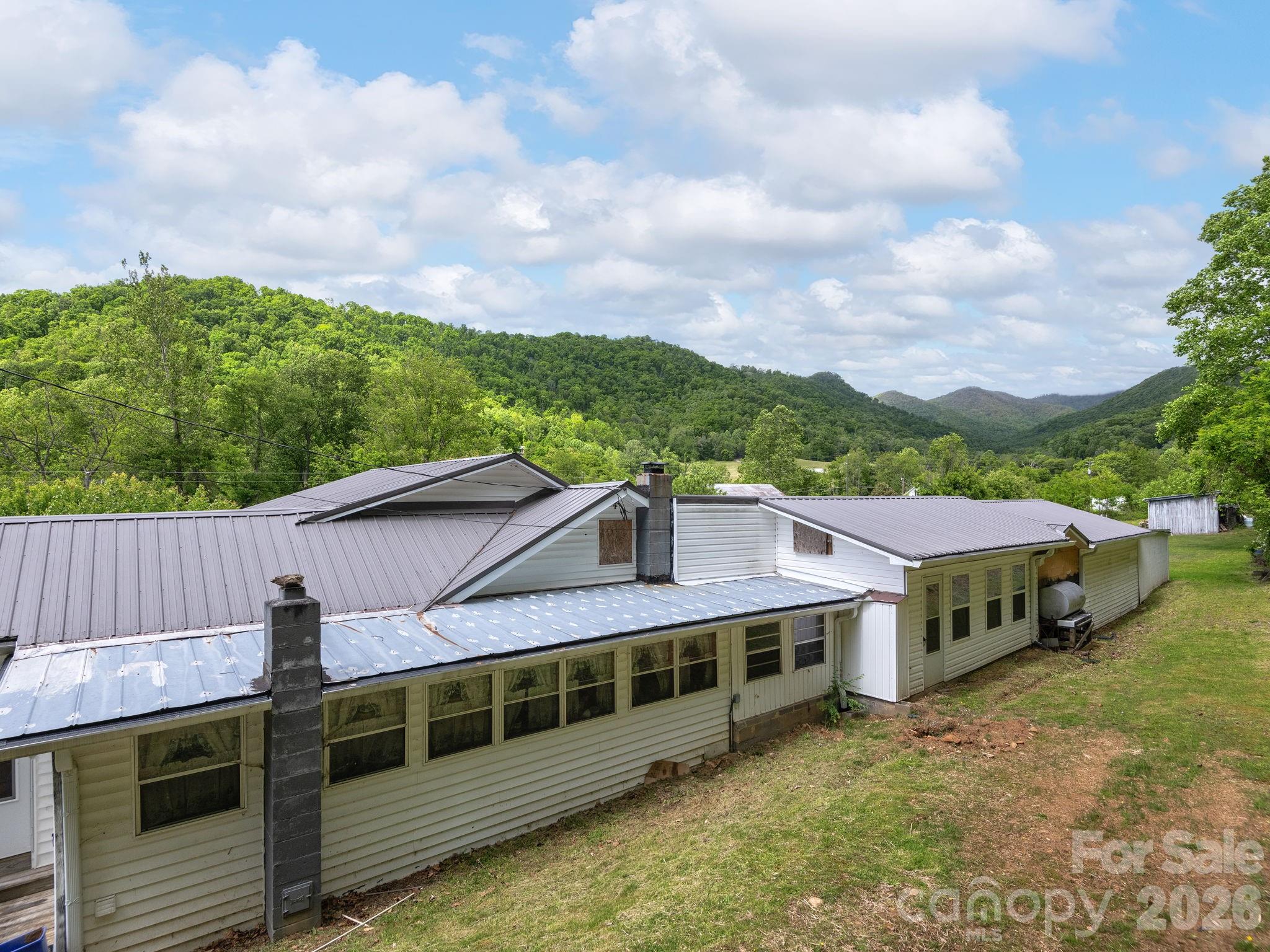 379 North Fork Road Barnardsville, NC 28709 - Photo 17 of 27 a aerial view of a house with a yard