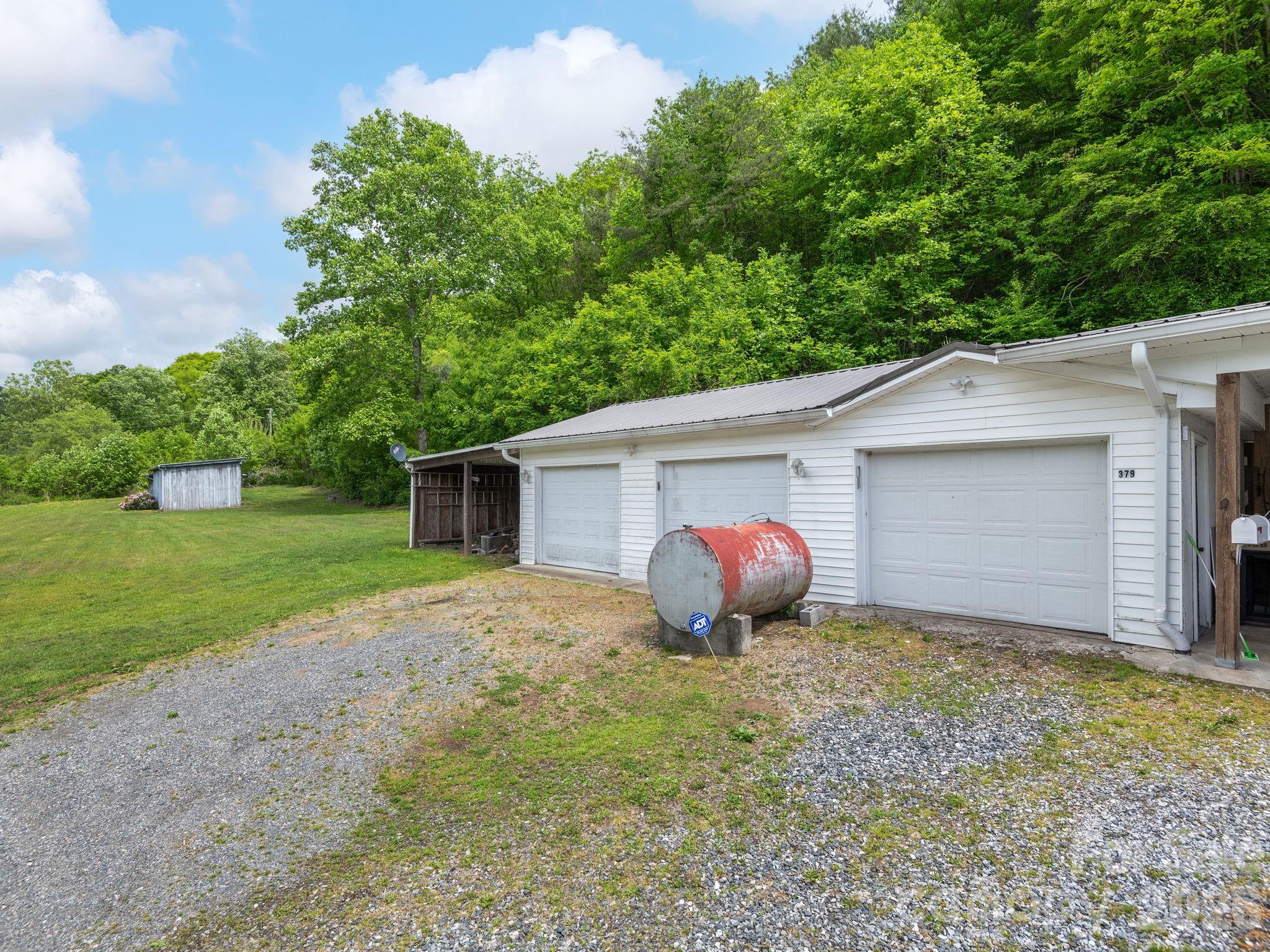 379 North Fork Road Barnardsville, NC 28709 - Photo 18 of 27 a view of a house with a yard