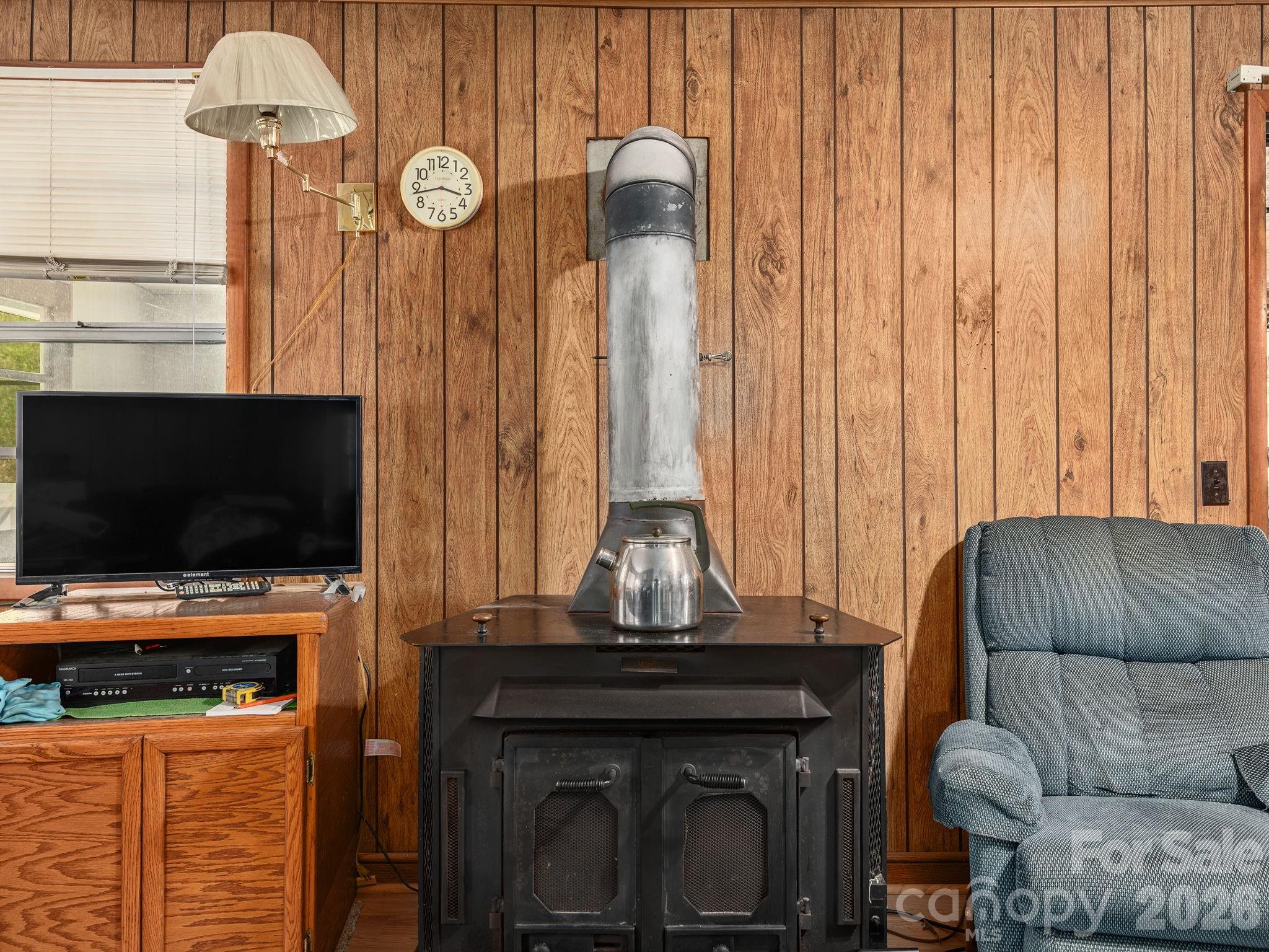 379 North Fork Road Barnardsville, NC 28709 - Photo 9 of 27 a living room with furniture and a flat screen tv