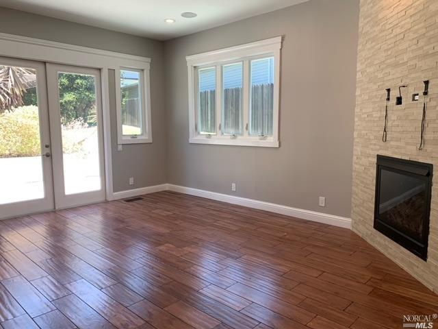 40 Villa Avenue San Rafael, CA 94901 - Photo 16 of 47 a view of an empty room with wooden floor and a window