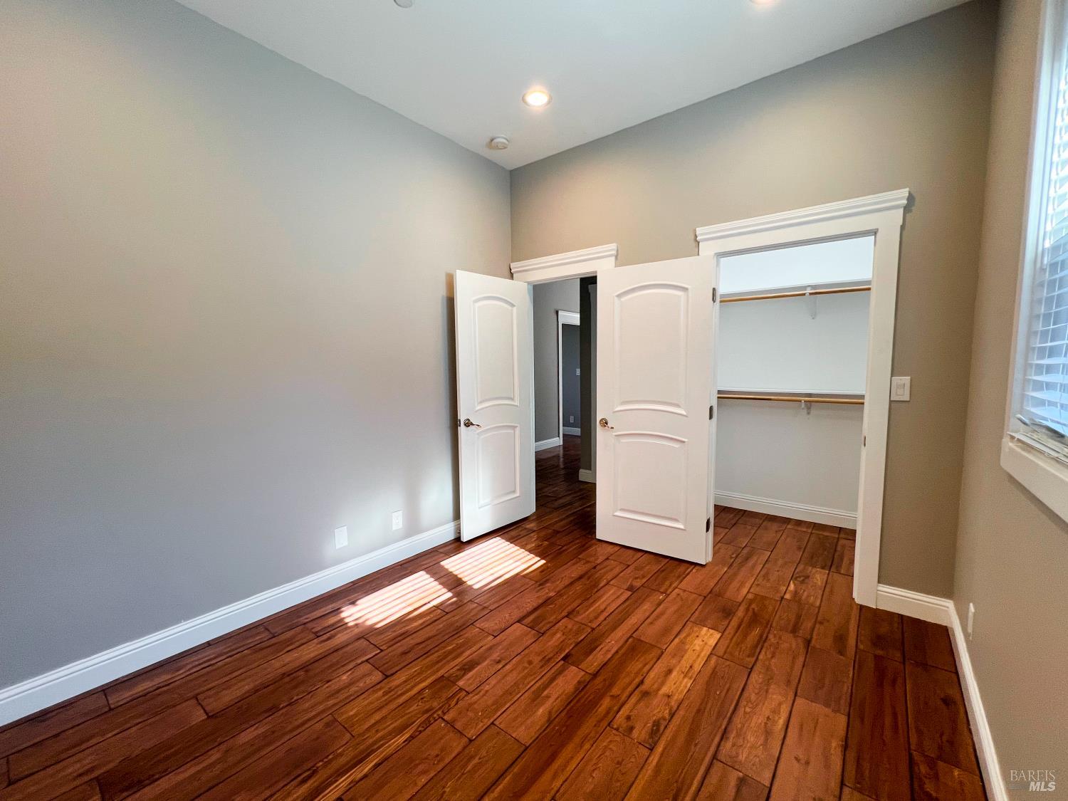 40 Villa Avenue San Rafael, CA 94901 - Photo 18 of 47 a view of an empty room with wooden floor and a window