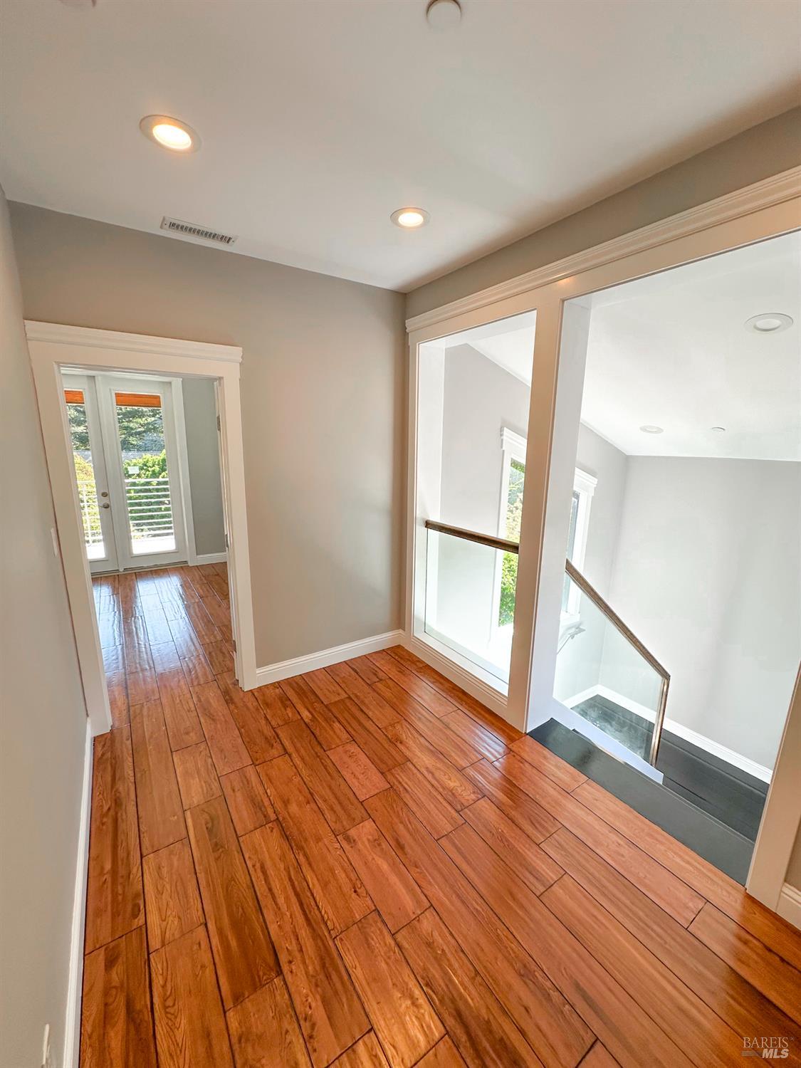 40 Villa Avenue San Rafael, CA 94901 - Photo 22 of 47 wooden floor in an empty room with a window
