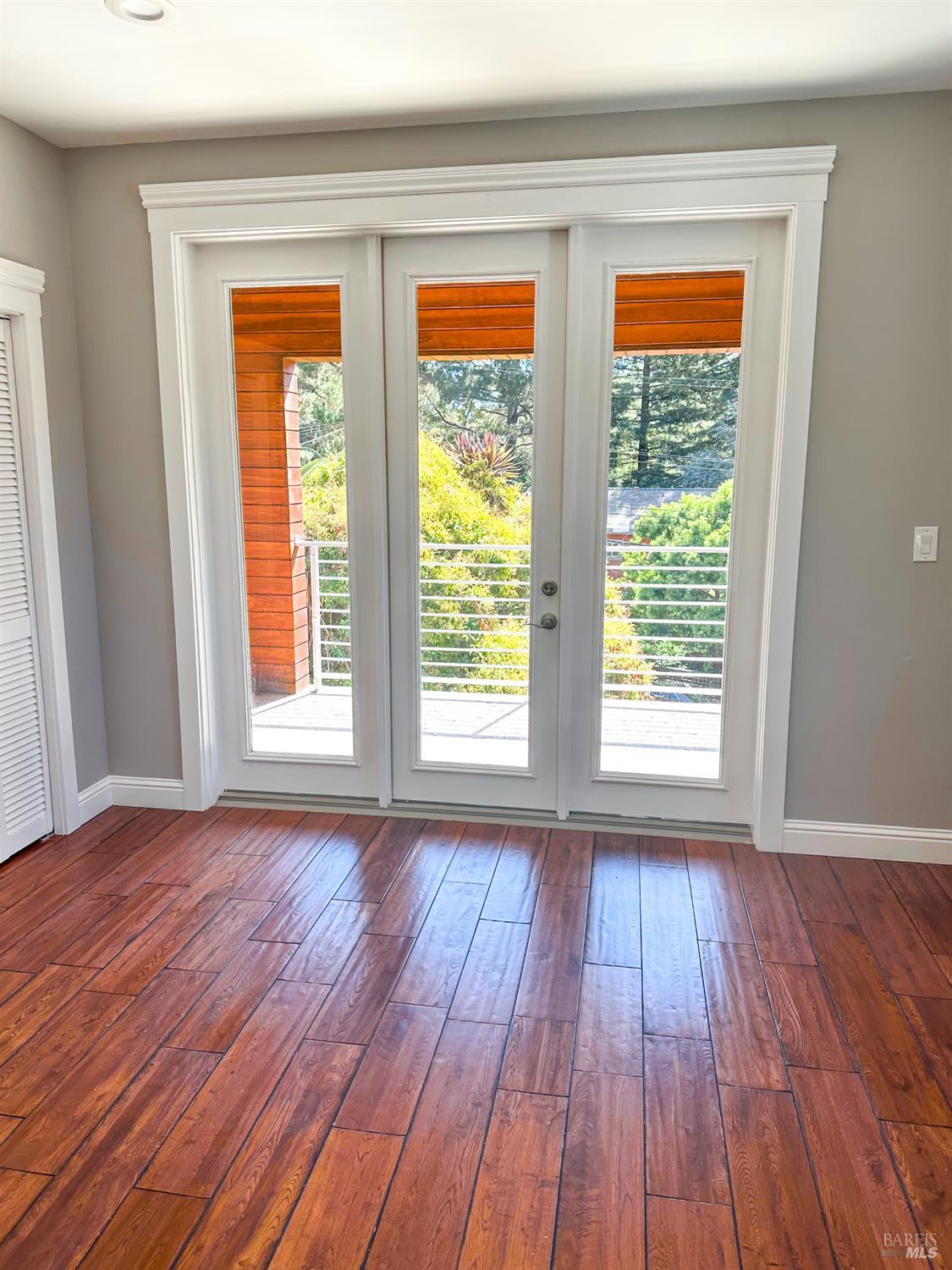 40 Villa Avenue San Rafael, CA 94901 - Photo 27 of 47 a view of an empty room with wooden floor and a window
