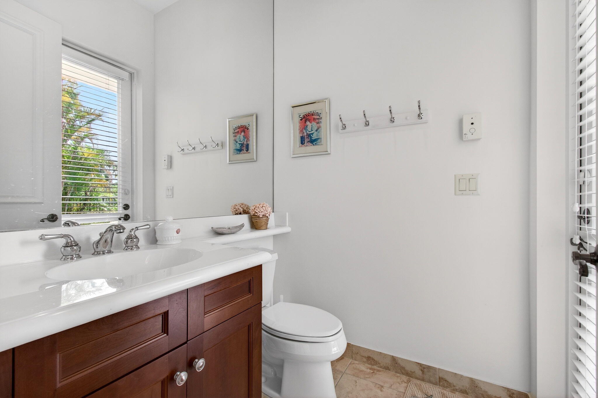 17728 Villa Club Way Boca Raton, FL 33496 - Photo 11 of 36 a bathroom with a sink vanity mirror and toilet