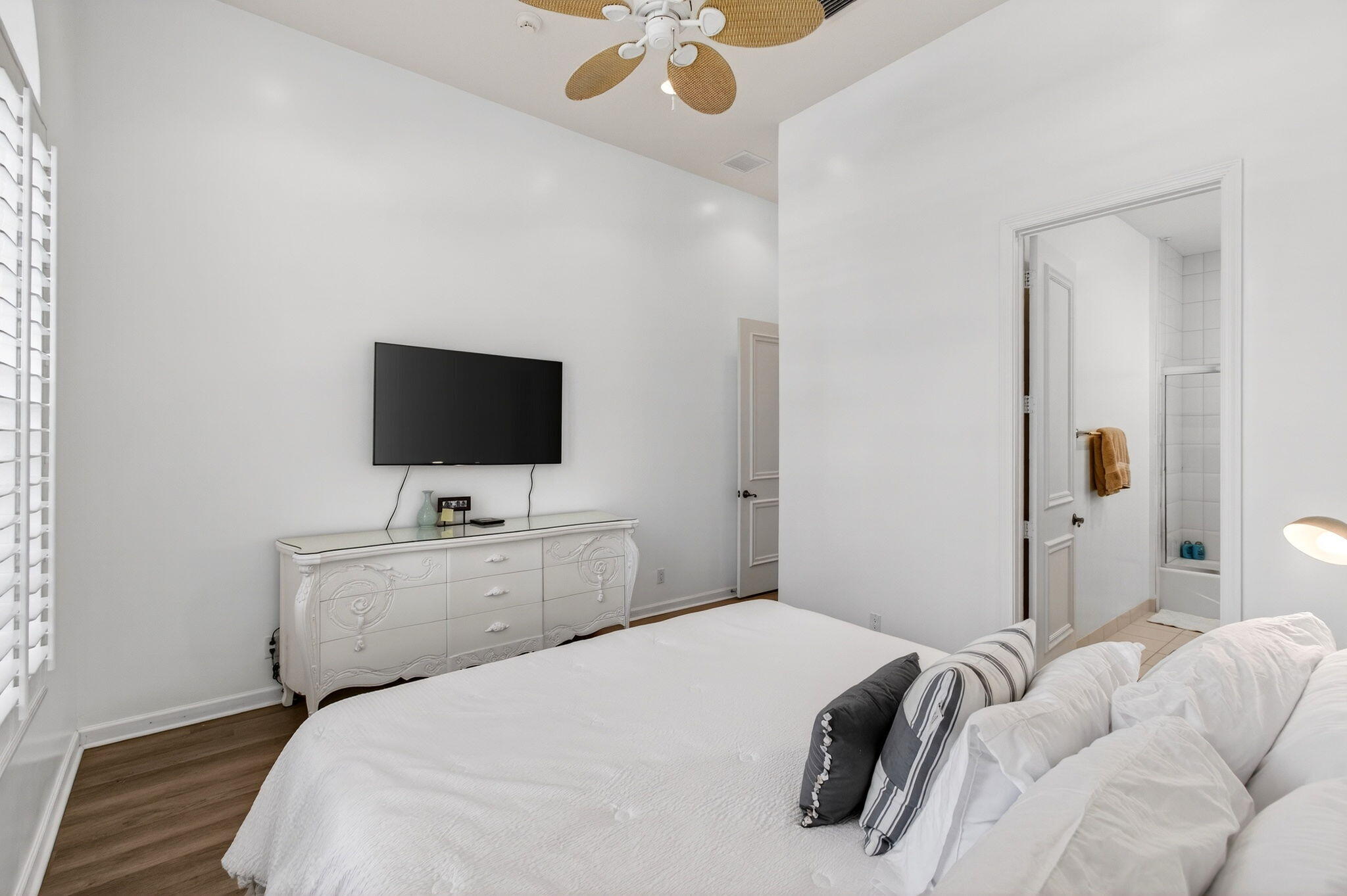 17728 Villa Club Way Boca Raton, FL 33496 - Photo 18 of 36 a bedroom with a bed and a flat screen tv