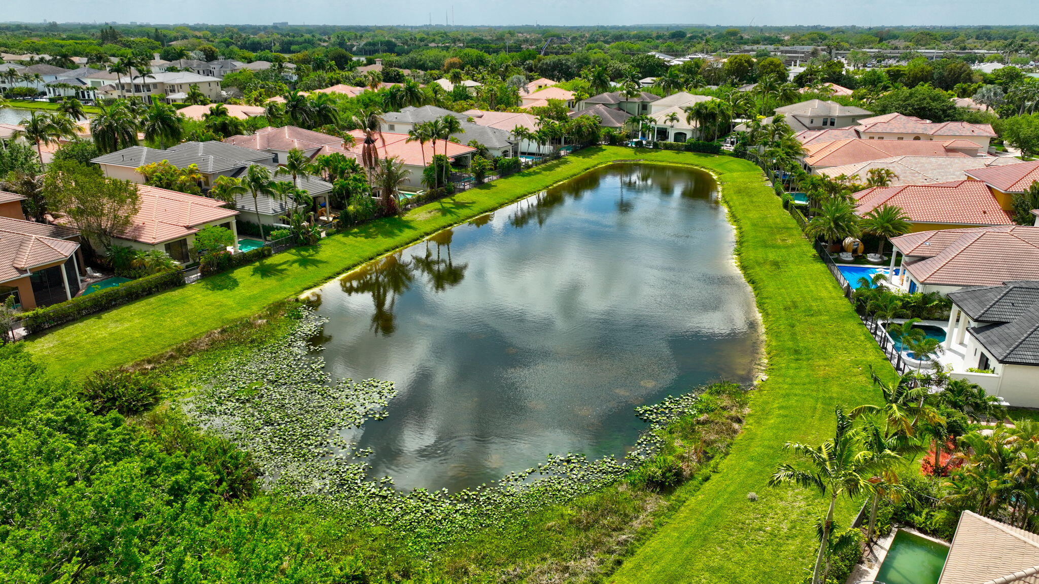 17728 Villa Club Way Boca Raton, FL 33496 - Photo 24 of 36 an aerial view of residential houses with outdoor space and swimming pool