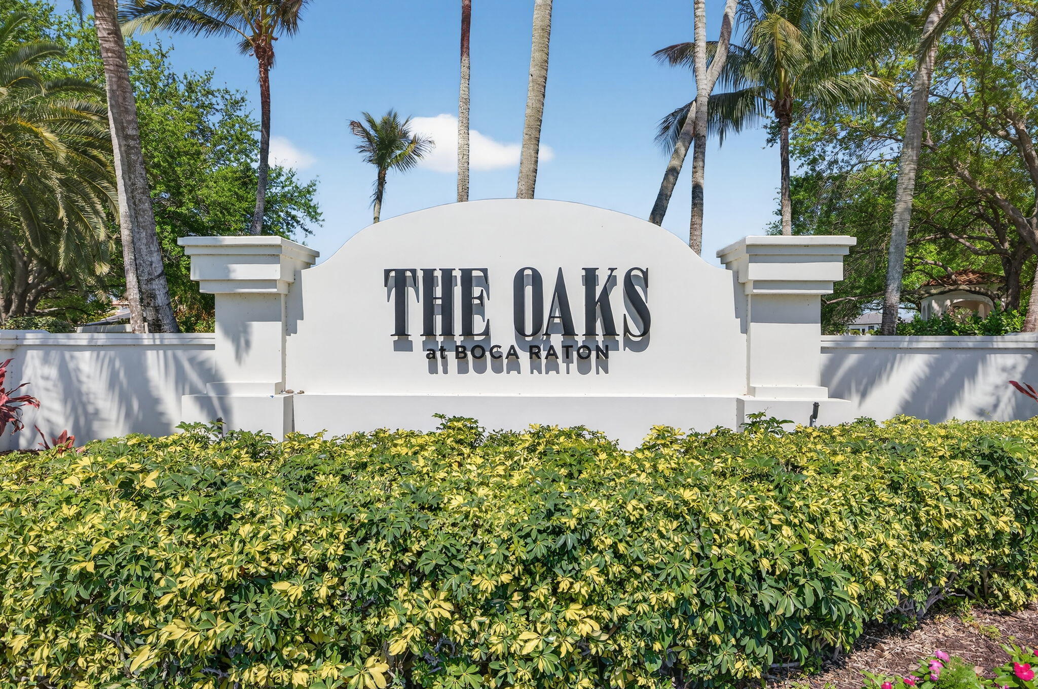 17728 Villa Club Way Boca Raton, FL 33496 - Photo 26 of 36 a view of a house with a yard and potted plants