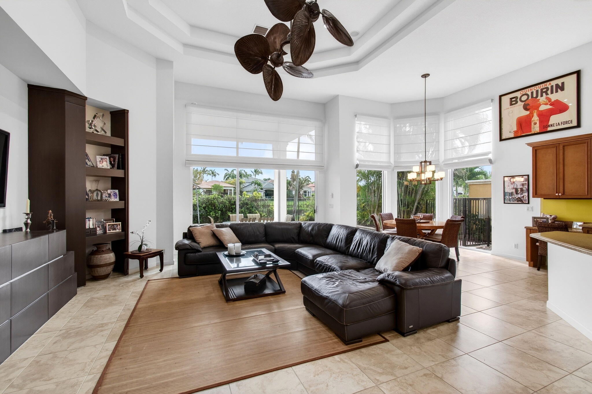 17728 Villa Club Way Boca Raton, FL 33496 - Photo 7 of 36 a living room with furniture ceiling fan and a window