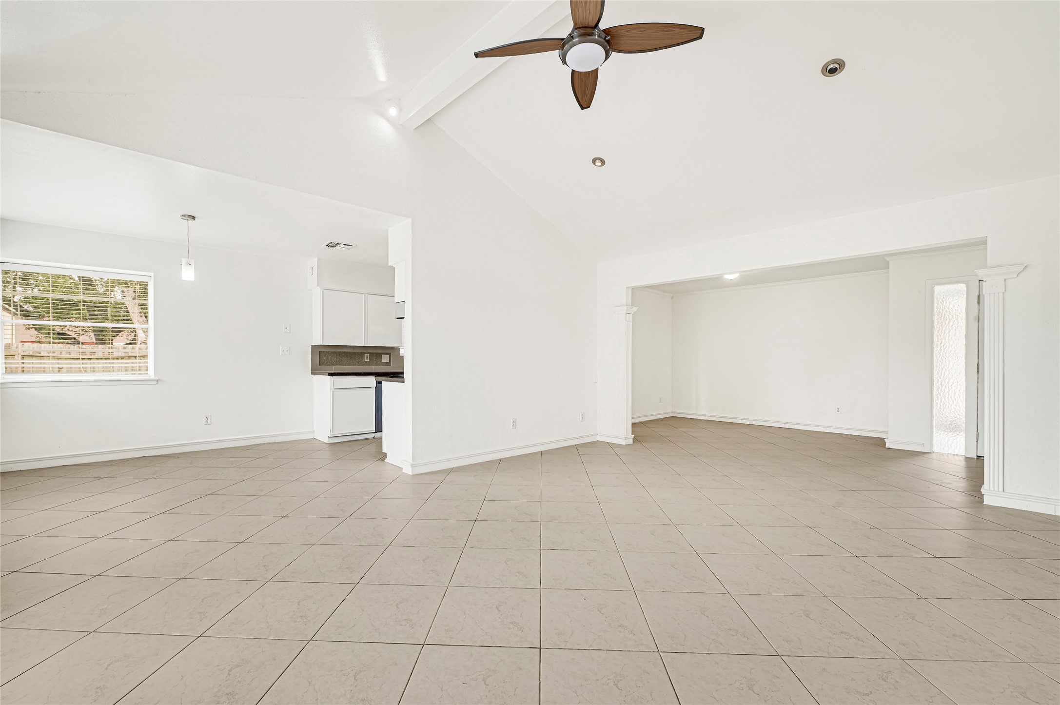 7302 Redding Road Houston, TX 77036 - Photo 19 of 26 a view of an empty room with a window