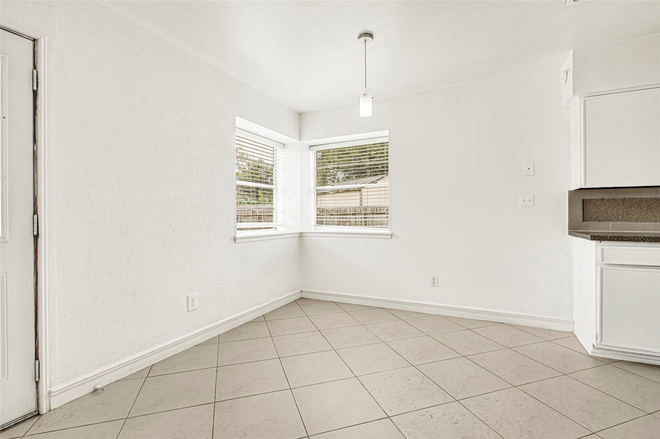 7302 Redding Road Houston, TX 77036 - Photo 20 of 26 a view of an empty room with a window