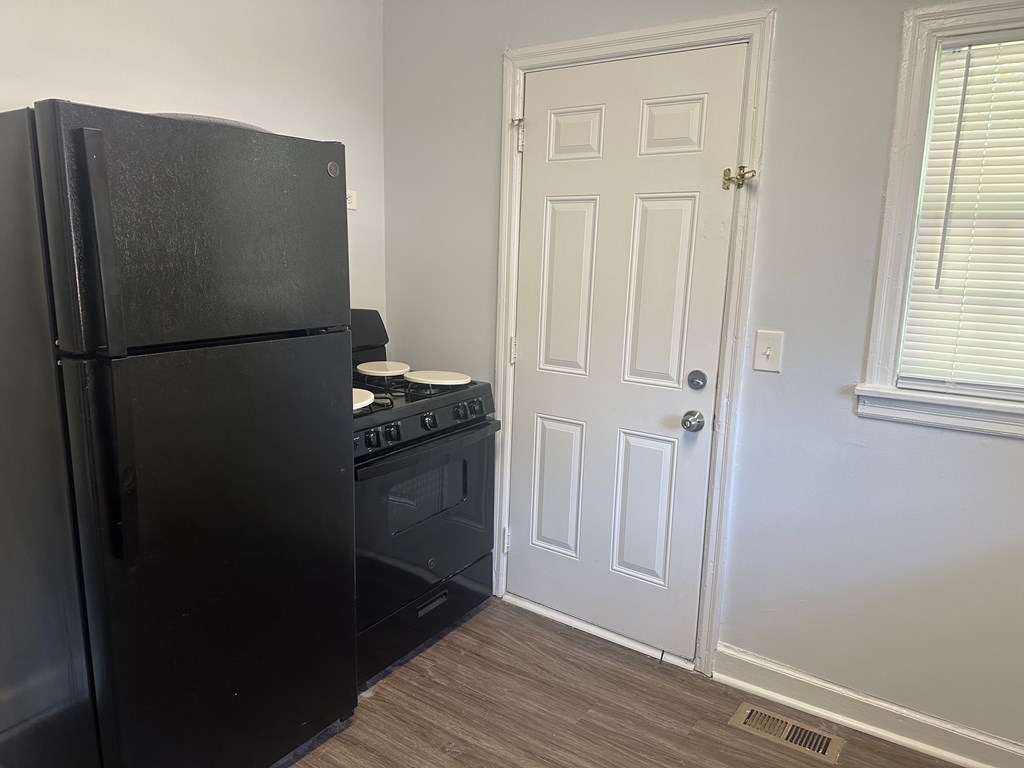 5636 Hunter Road Columbus, GA 31907 - Photo 7 of 10 a white refrigerator freezer sitting inside of a kitchen
