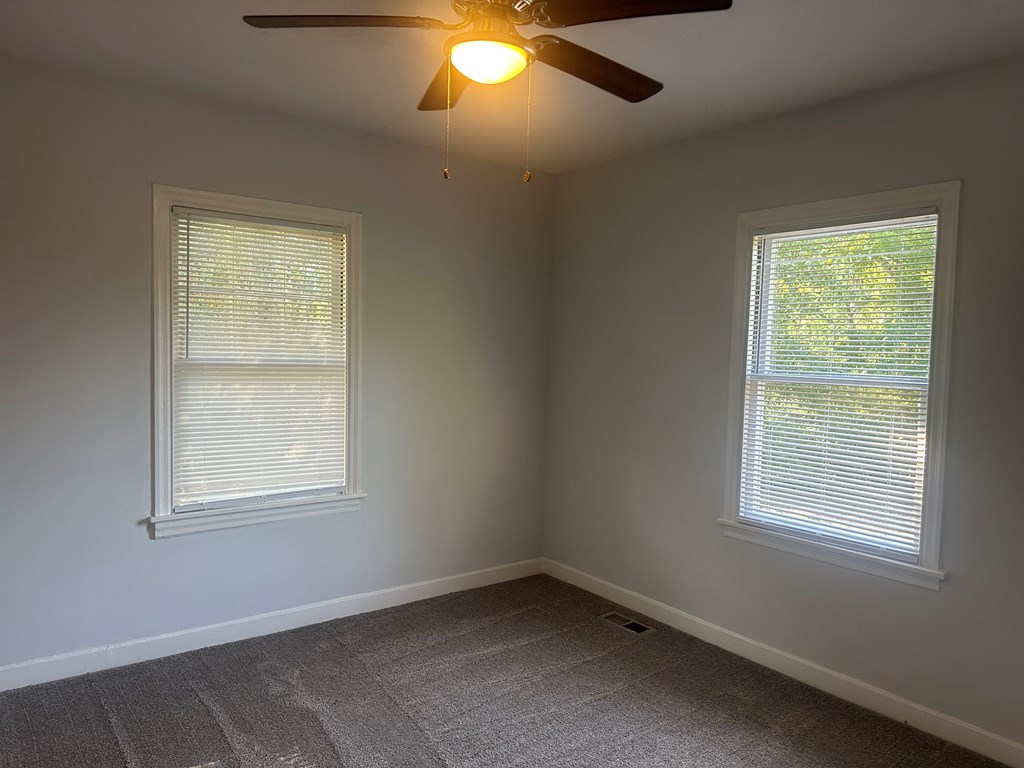 5636 Hunter Road Columbus, GA 31907 - Photo 8 of 10 an empty room with a window