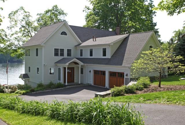 33 Knollcrest Road New Fairfield, CT 06812 - Photo 1 of 1 a front view of a house with garden