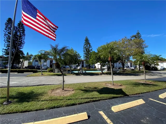 a park with lots of trees and plants