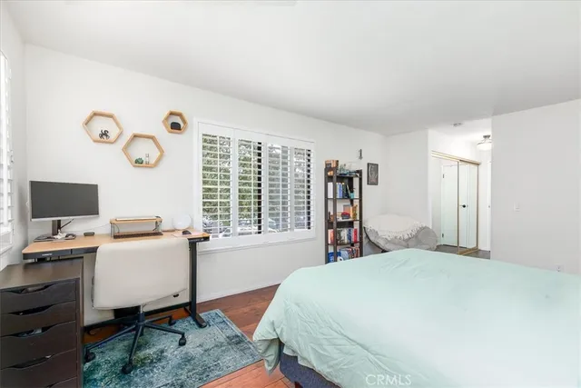 a large bathroom with a sink and a mirror