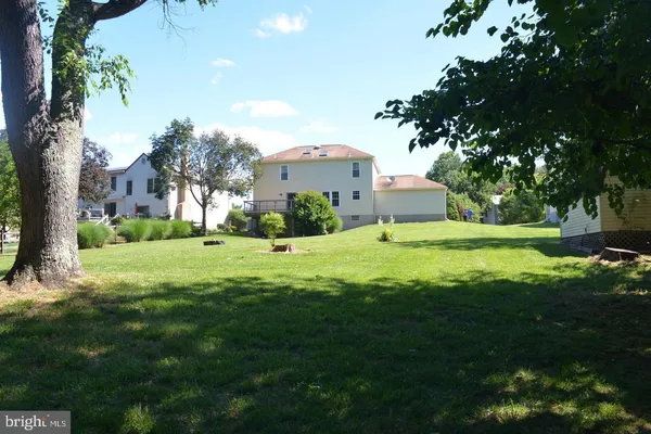 a view of a house with a big yard