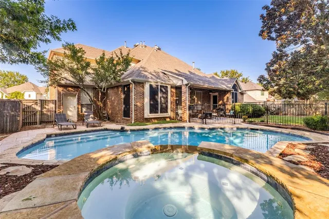 a view of a house with swimming pool