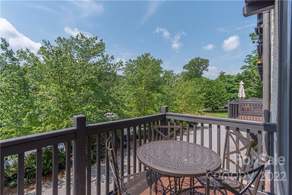 7 Fitzgerald Road Black Mountain, NC 28711 - Photo 12 of 23 a view of a chair and table in the balcony